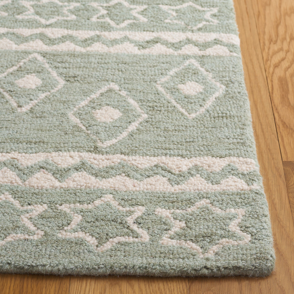 SAFAVIEH Handmade Micro-Loop Kobie Wool Rug