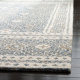 SAFAVIEH Handmade Micro-Loop Lutetia Wool Rug