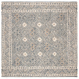 SAFAVIEH Handmade Micro-Loop Lutetia Wool Rug