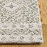 SAFAVIEH Handmade Micro-Loop Lutetia Wool Rug