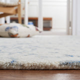 SAFAVIEH Handmade Micro-Loop Maribelle Modern Wool Rug