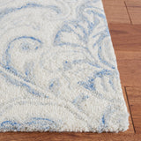 SAFAVIEH Handmade Micro-Loop Maribelle Modern Wool Rug