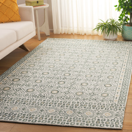 SAFAVIEH Handmade Micro-Loop Reglind Wool Rug