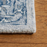 SAFAVIEH Handmade Micro-Loop Torbjorg Wool Rug