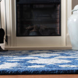 SAFAVIEH Handmade Micro-Loop Utta Wool Rug