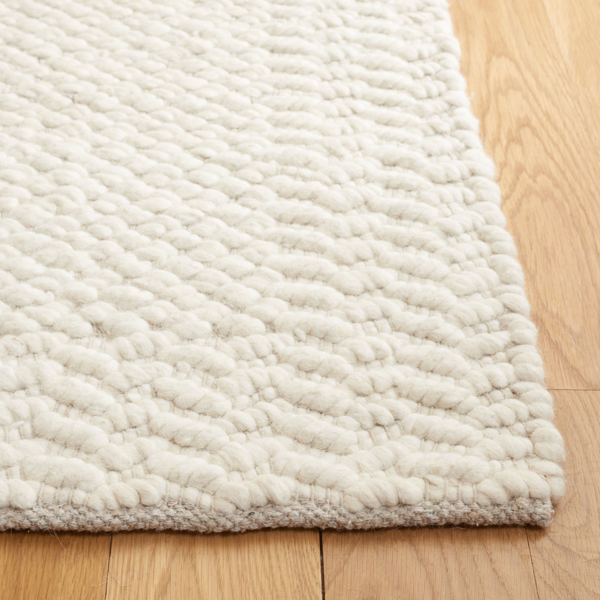 SAFAVIEH Handmade Natura Done Textured Wool Rug