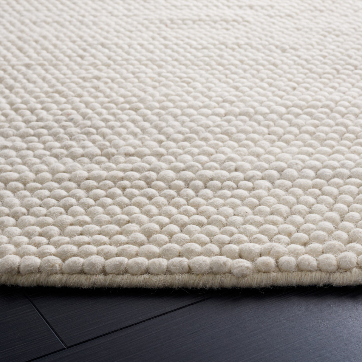 SAFAVIEH Handmade Natura Gonnie Wool Rug