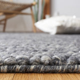 SAFAVIEH Handmade Natura Gonnie Wool Rug