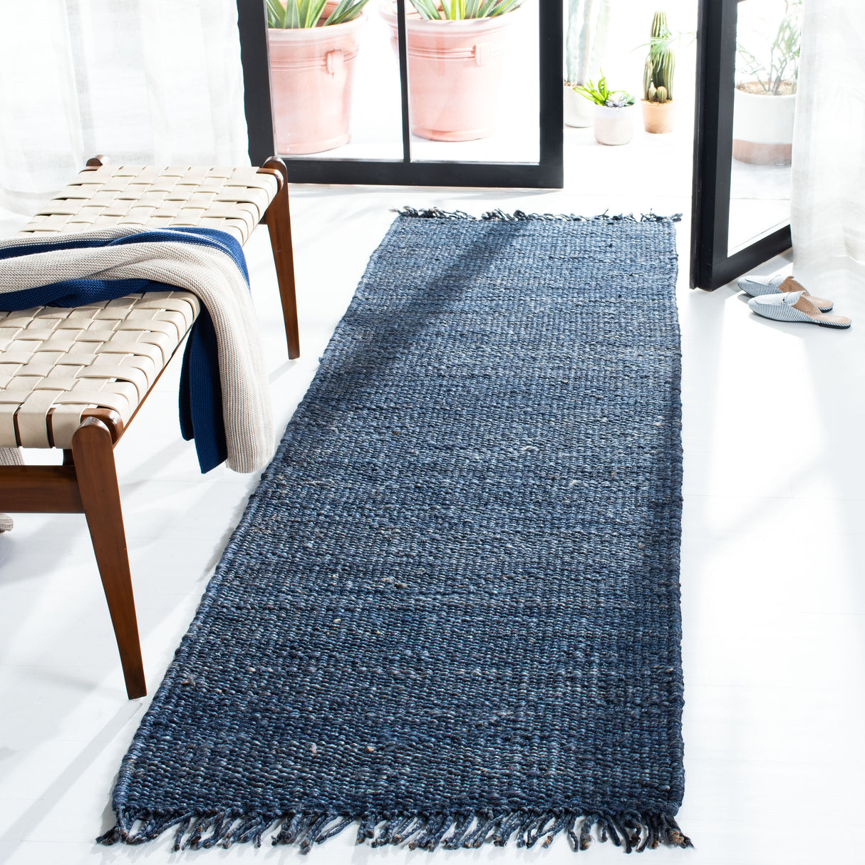 SAFAVIEH Handmade Natural Fiber Eybjorg Jute Fringe Rug