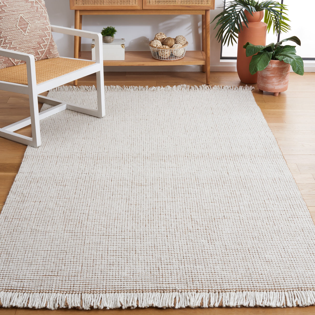 SAFAVIEH Handmade Natural Fiber Reneta Jute Fringe Rug