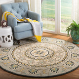 SAFAVIEH Handmade Novelty Jaylynn Mandala Wool Rug