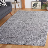 SAFAVIEH Handmade Ortanta Shag Bibeta Wool Rug