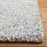 SAFAVIEH Handmade Ortanta Shag Bibeta Wool Rug