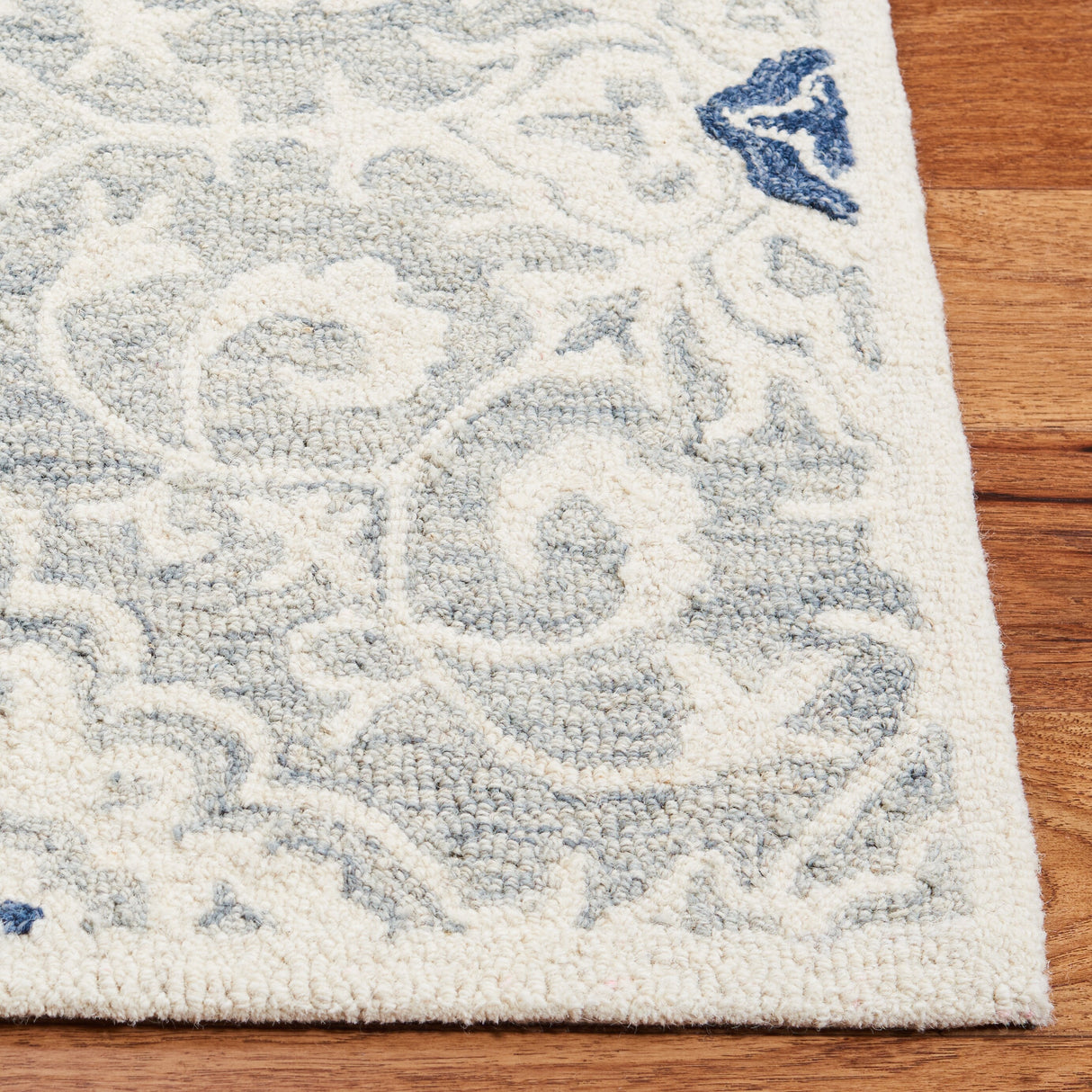 SAFAVIEH Handmade Roslyn Raegan Wool Rug