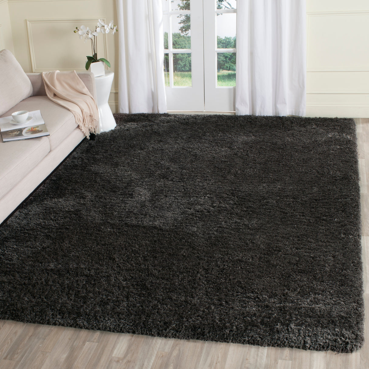 SAFAVIEH Handmade Ryann Shag Anneclaar Solid Polyester Rug