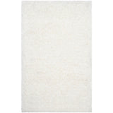 SAFAVIEH Handmade Ryann Shag Anneclaar Solid Polyester Rug