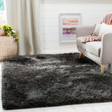 SAFAVIEH Handmade Ryann Shag Anneclaar Solid Polyester Rug