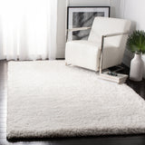 SAFAVIEH Handmade Ryann Shag Anneclaar Solid Polyester Rug