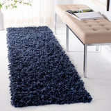 SAFAVIEH Handmade Sheep Shag Malti Solid Area Rug