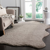 SAFAVIEH Handmade Sheep Shag Nurhayat Solid Rug