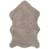 SAFAVIEH Handmade Sheep Shag Nurhayat Solid Rug