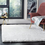 SAFAVIEH Handmade South Beach Jayla Shag Solid Polyester Rug