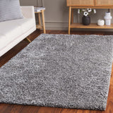 SAFAVIEH Handmade South Beach Jayla Shag Solid Polyester Rug