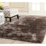 SAFAVIEH Handmade South Beach Jayla Shag Solid Polyester Rug