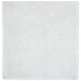 SAFAVIEH Handmade South Beach Jayla Shag Solid Polyester Rug