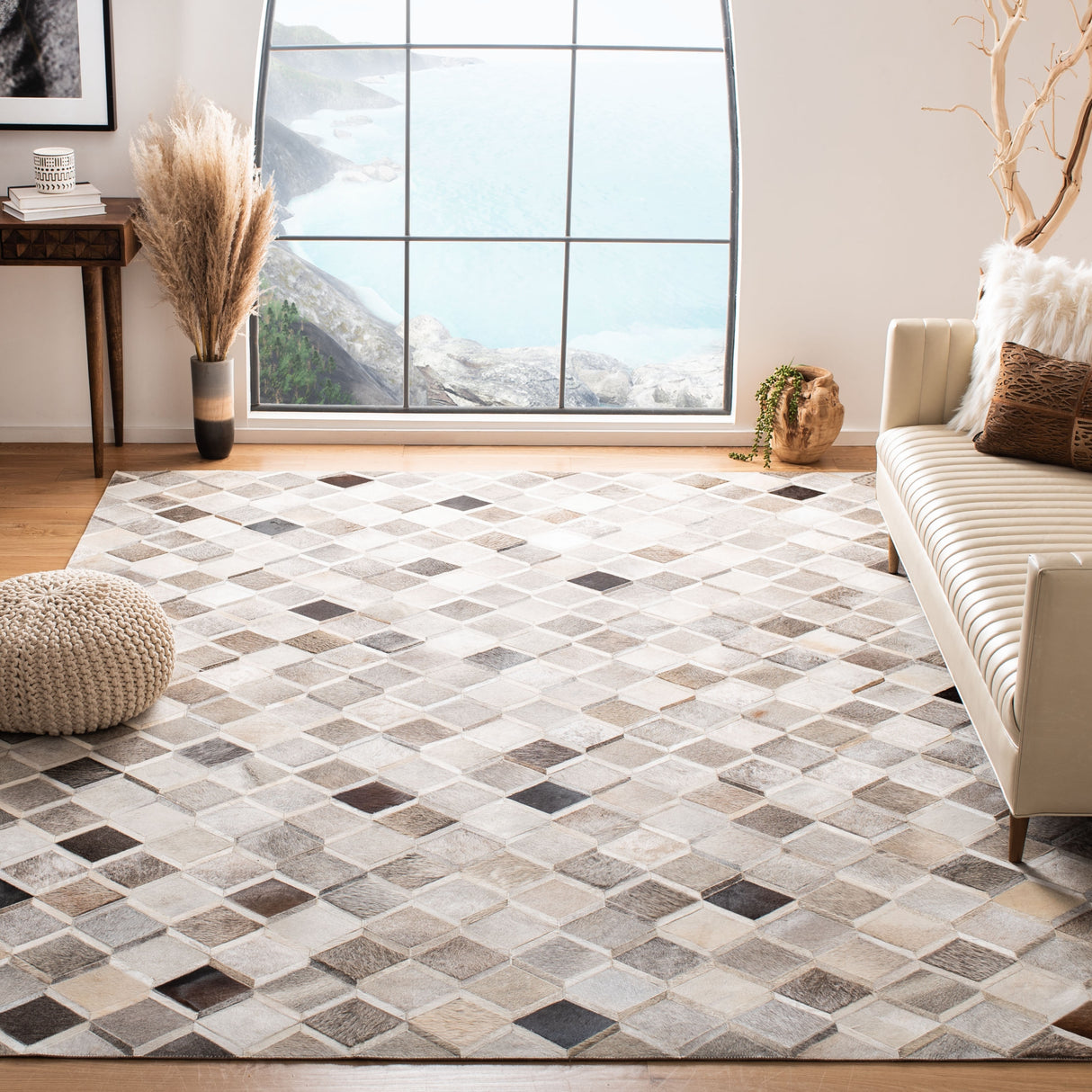 SAFAVIEH Handmade Studio Leather Cecily Natural Hide Leather Rug