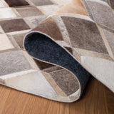 SAFAVIEH Handmade Studio Leather Cecily Natural Hide Leather Rug