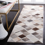 SAFAVIEH Handmade Studio Leather Cecily Natural Hide Leather Rug