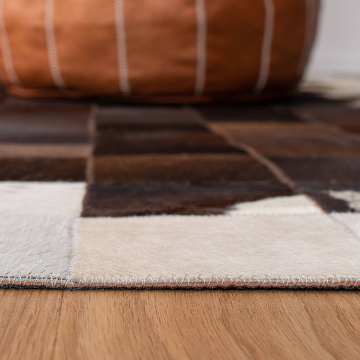 SAFAVIEH Handmade Studio Leather Haley Natural Hide Leather Rug