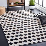 SAFAVIEH Handmade Studio Leather Nia Mid-Century Modern Rug