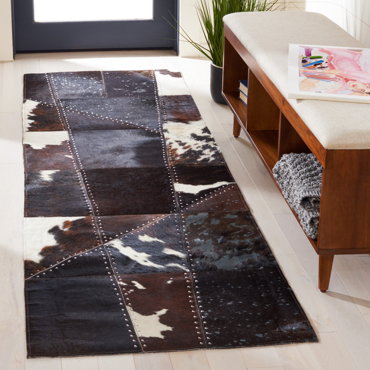 SAFAVIEH Handmade Studio Leather Zafirka Modern Rug