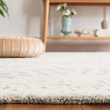 SAFAVIEH Handmade Textural Fidenzia Contemporary Wool Rug