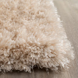 SAFAVIEH Handmade Toronto Shag Yasmine Polyester Rug