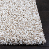 SAFAVIEH Handmade Ultimate Shag Makayla Rug