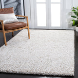 SAFAVIEH Handmade Ultimate Shag Makayla Rug