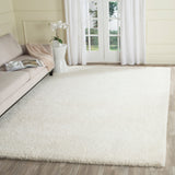 SAFAVIEH Handmade Ultimate Shag Makayla Rug