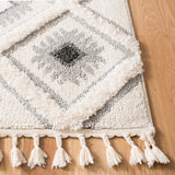 SAFAVIEH Moroccan Tassel Shag Zheljazka 2-inch Thick Rug