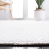 SAFAVIEH Nonskid Nguyet Solid Rug