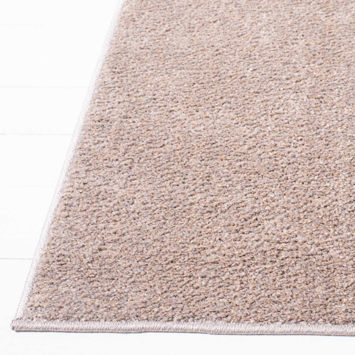 SAFAVIEH Nonskid Nguyet Solid Rug