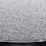 SAFAVIEH Nonskid Nguyet Solid Rug