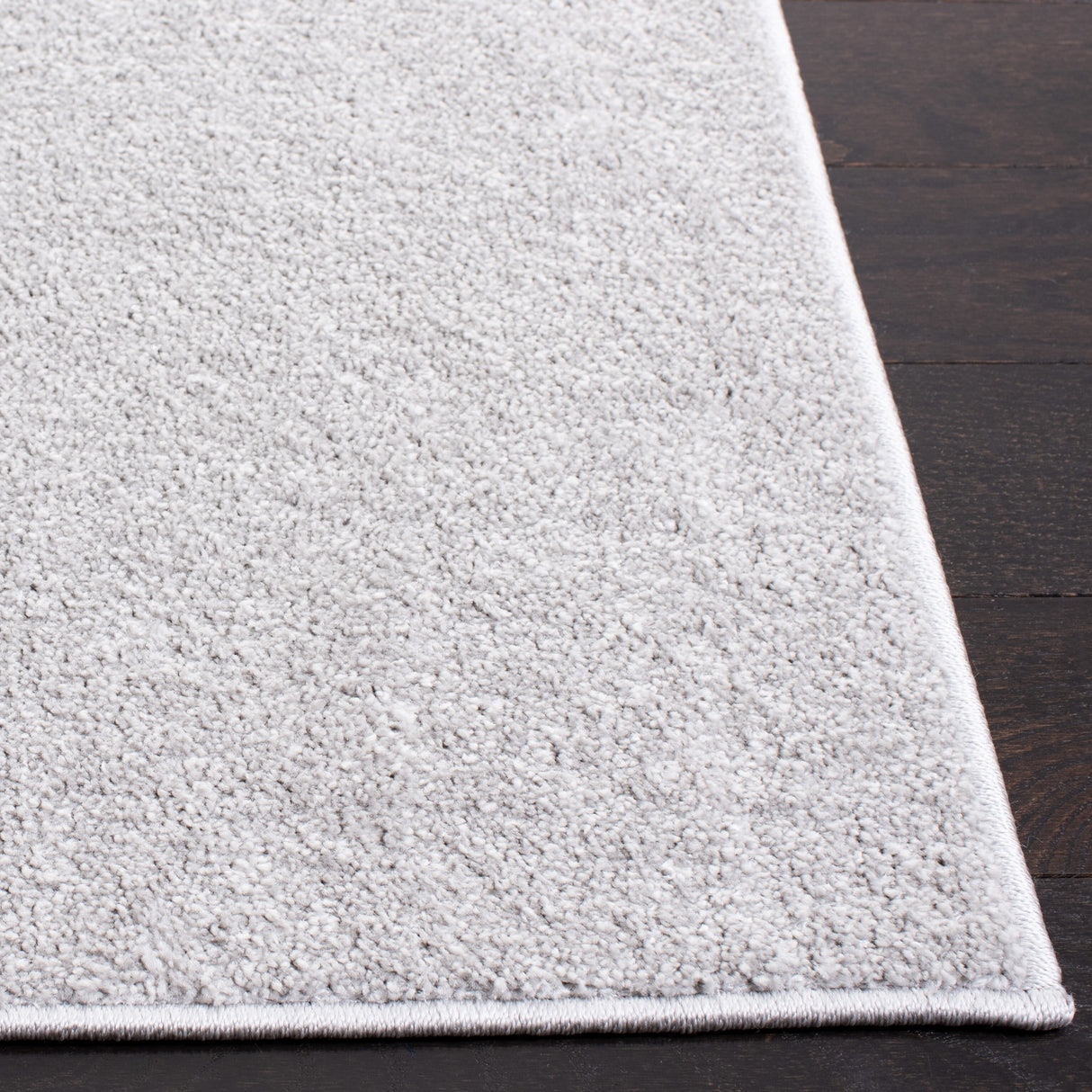 SAFAVIEH Nonskid Nguyet Solid Rug