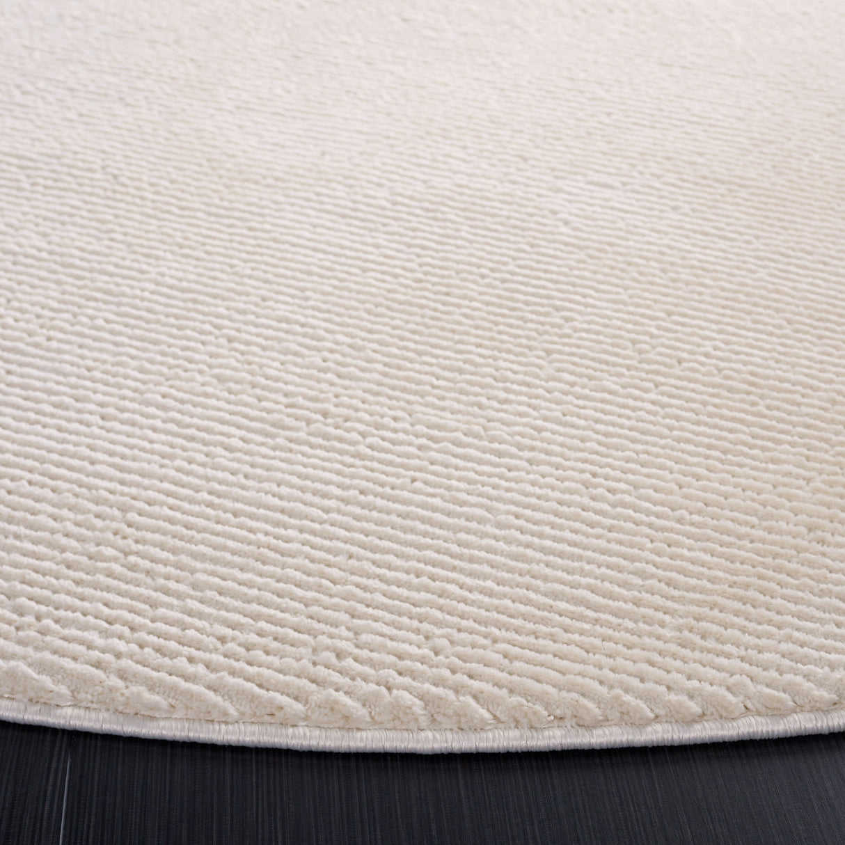 SAFAVIEH Revive Avie Solid Rug