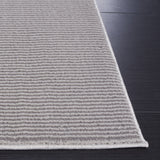 SAFAVIEH Revive Avie Solid Rug