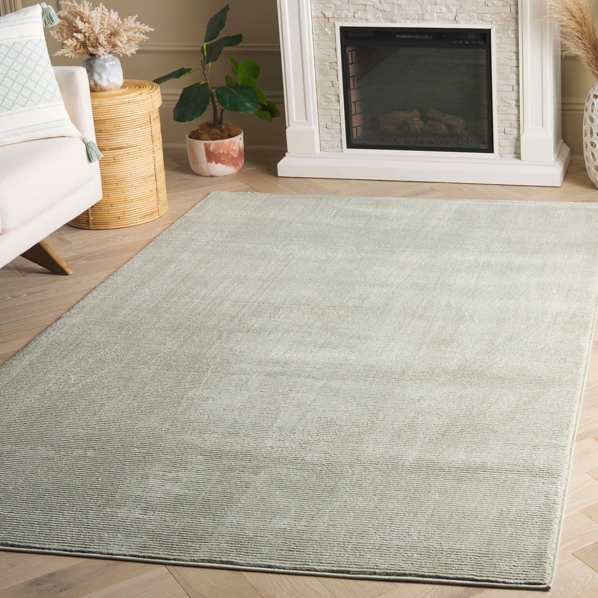 SAFAVIEH Revive Avie Solid Rug