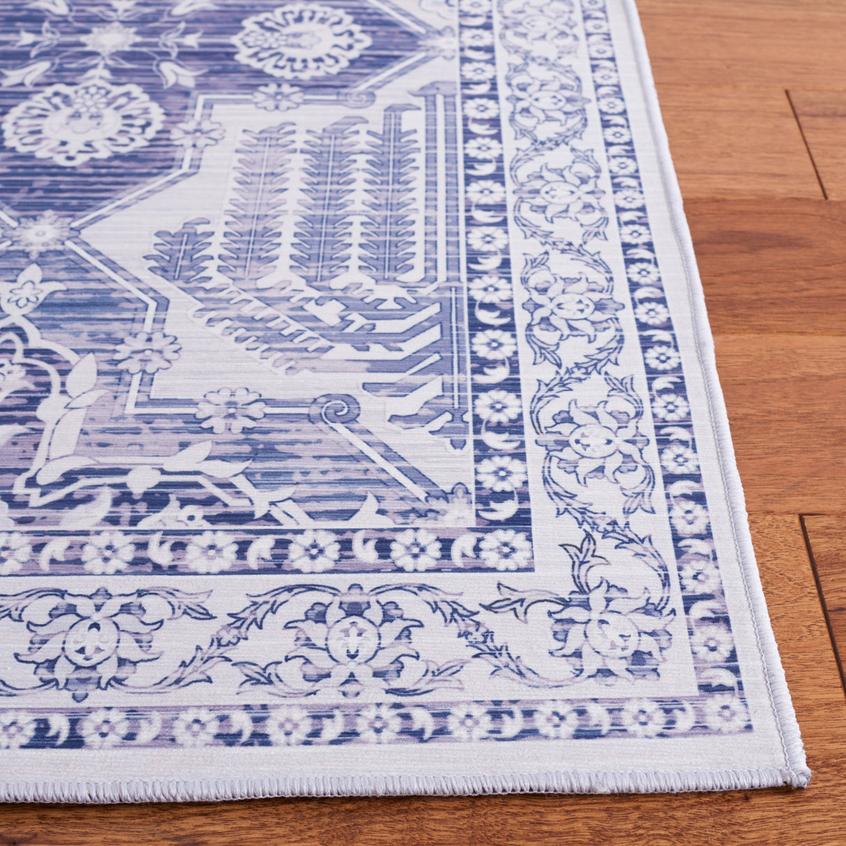 SAFAVIEH Tucson Machine Washable Slip Resistant Biruta Rug