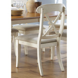 The Gray Barn Broken Bison Bisque with Natural Pine X-back Dining Chair